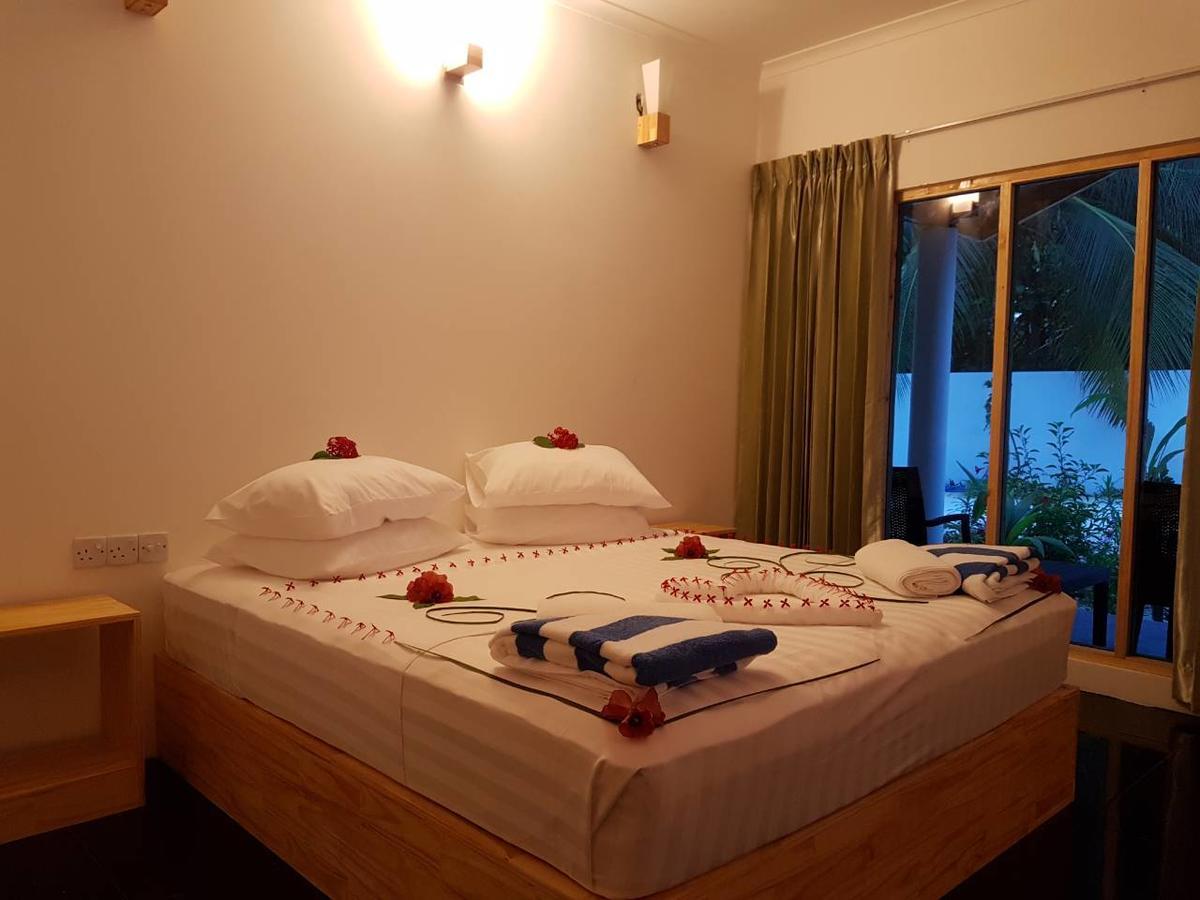 Thoddoo Beach Holiday Extérieur photo